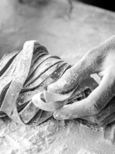 Chef making traditional italian homemade pasta