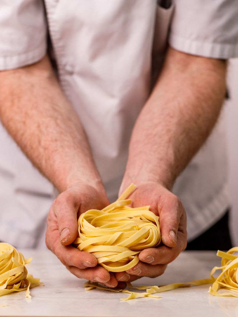 Chef Gord portioning Pasta